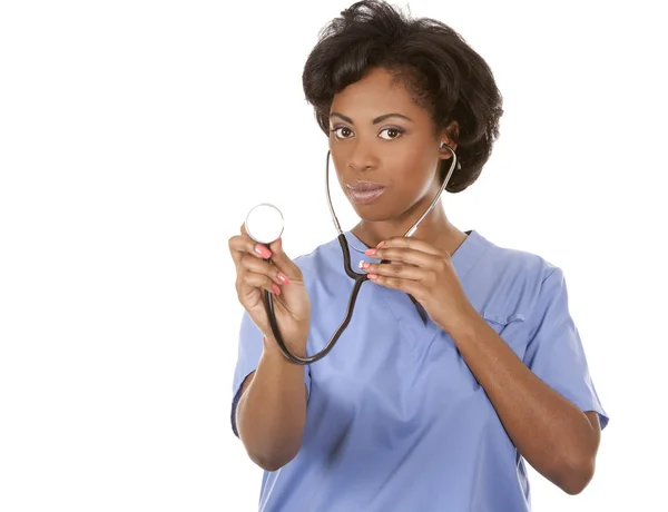 Nurse using stethoscope — Stock Photo, Image