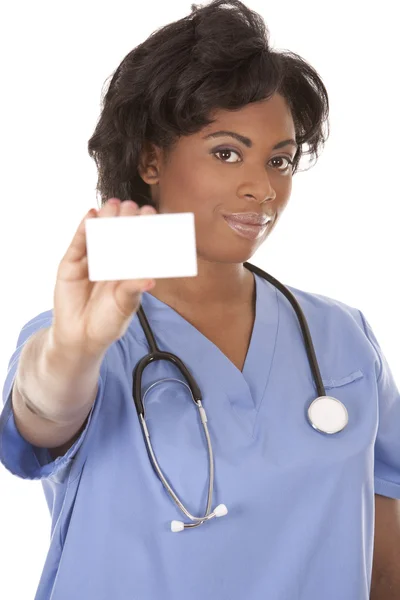 Nurse holding business card — Stock Photo, Image