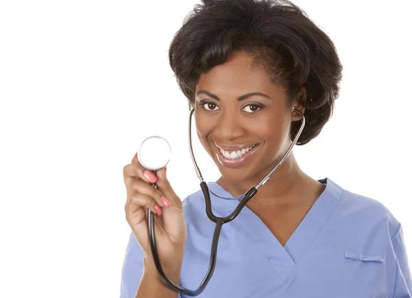 Nurse using stethoscope Stock Picture