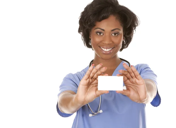 Nurse holding business card — Stock Photo, Image
