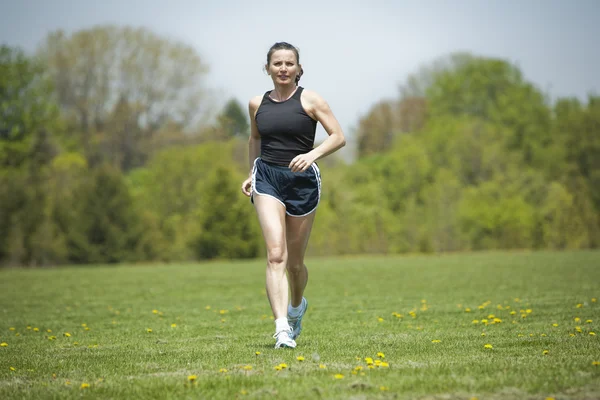 Mulher madura correndo — Fotografia de Stock