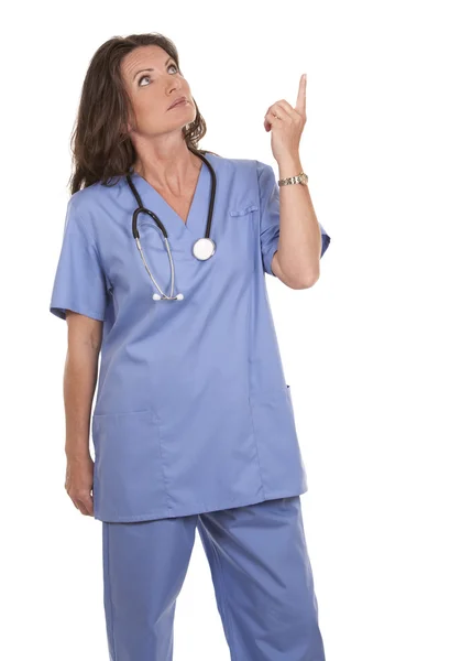 Enfermeira apontando — Fotografia de Stock