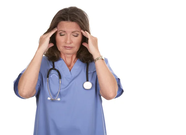 Verpleegster met een hoofdpijn — Stockfoto