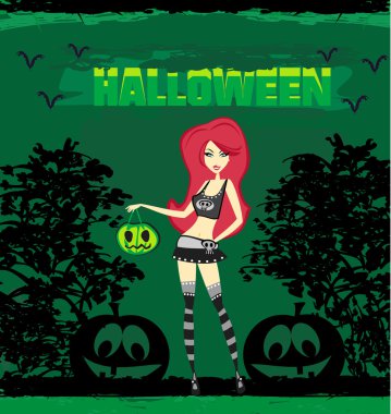 Cadılar Bayramı cadısı balkabağıyla ayakta duruyor