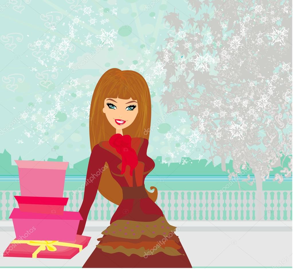 Fashion shopping girl with gift box
