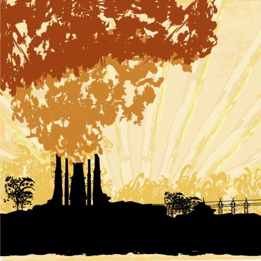 Fabrika bacasından yoğun duman çıkıyor.