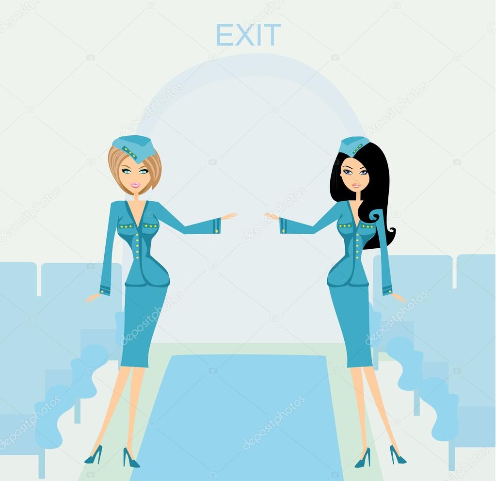 Two beautiful stewardess in blue uniforms inside an airliner pas