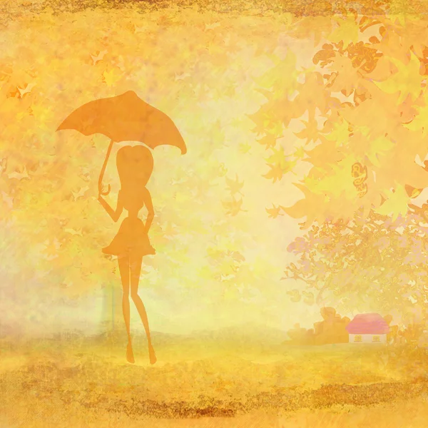 Dívka s deštníkem v podzimní krajina — Stock fotografie