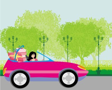 Üstü açık pembe bir kız ve hediyeler.