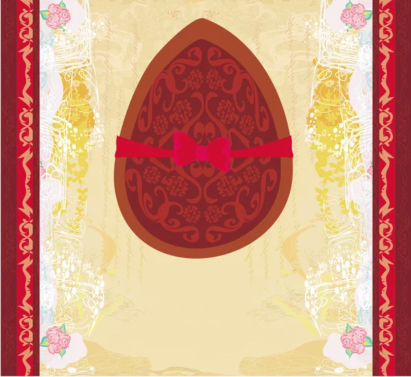 Vector illustration of chocolate egg with red bow — Stock Vector