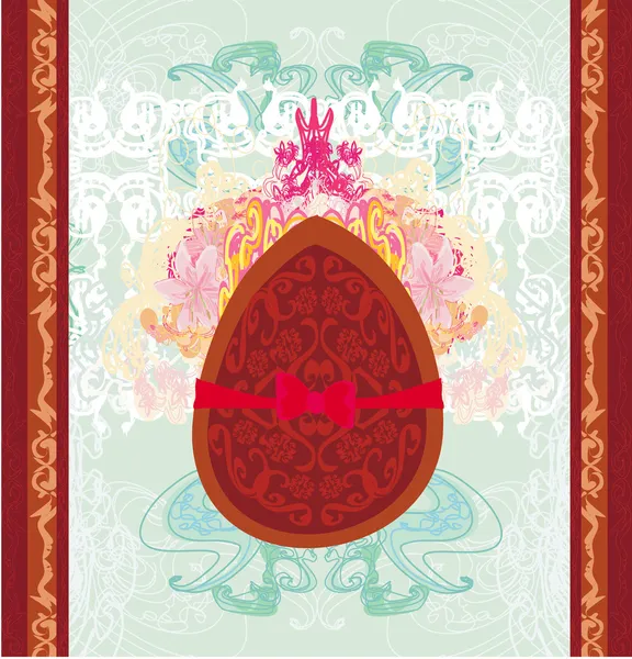 Vector illustration of chocolate egg with red bow — Stock Vector