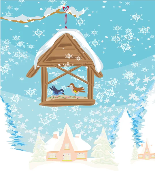 Birdfeeder in de winter — Stockvector