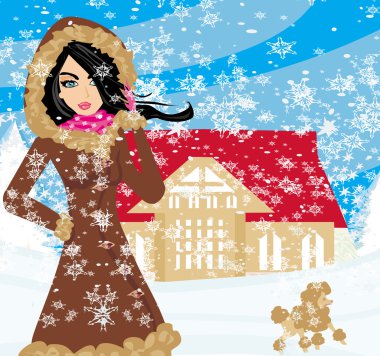 Karlı bir günde köpeği gezdir.