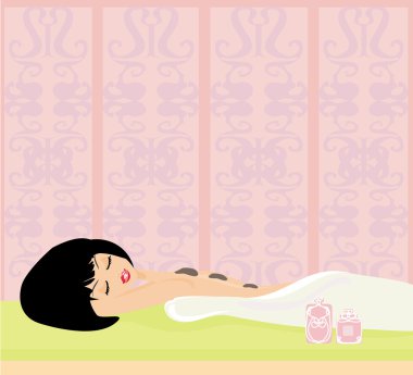 Sırtındaki taşlarla zarif spa zevk güzel kız