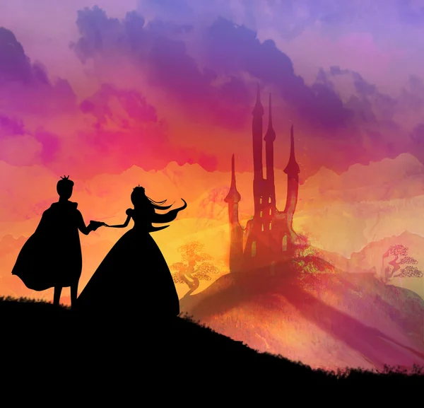 Волшебный замок и принцесса с принцем — стоковое фото