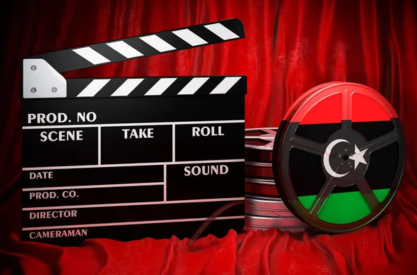 Libyan cinematography, film industry, cinema in Libya, concept. Clapperboard with and film reels on the red fabric, 3D rendering