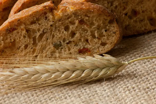 Close view of bread with wheat — Stock Photo, Image