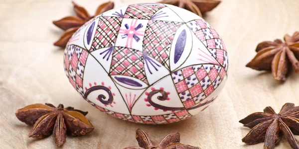 Star anise and decorated egg — Stock Photo, Image