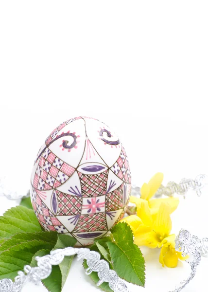Egg with ribbon and leaves — Stock Photo, Image