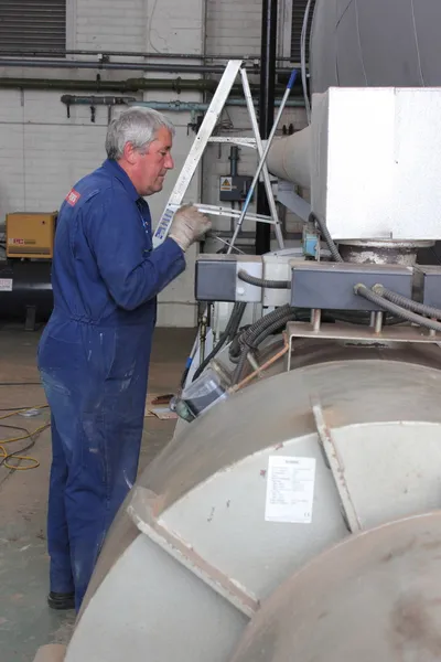 Painting a large steam boiler — Stock Photo, Image