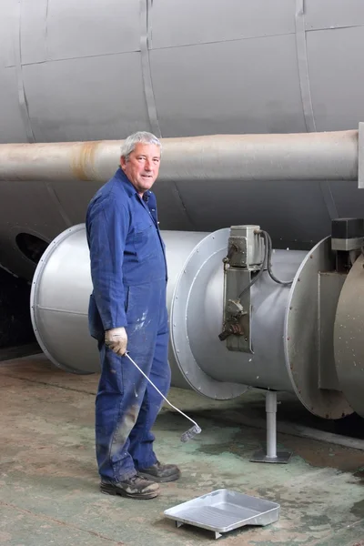 Painting a large steam boiler — Stock Photo, Image