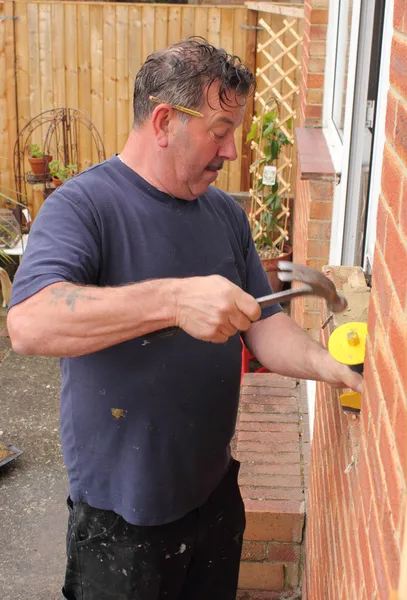 Window fitter at work — Stock Photo, Image