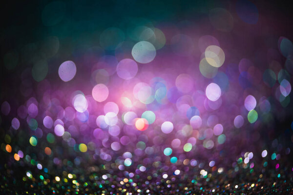 bokeh effect glitter colorful blurred abstract background for birthday, anniversary, wedding, new year eve or Christmas.