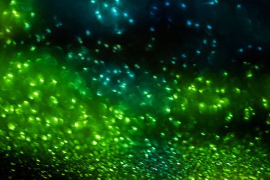 Doğum günü, yıldönümü, düğün, yeni yıl arifesi ya da Noel arifesi için parlak, bulanık ve soyut bir arka plan.