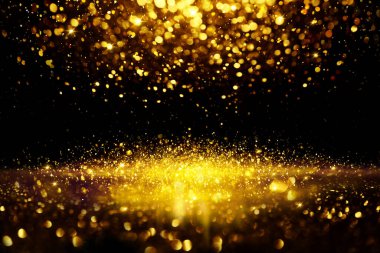 Altın parıltılı bokeh aydınlatma dokusu doğum günü, yıldönümü, düğün, yeni yıl arifesi veya Noel için soyut arkaplanı bulanıklaştırdı