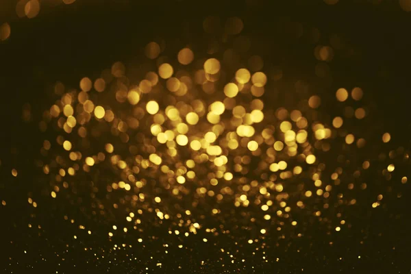 黄金の輝きボケの照明テクスチャ誕生日 記念日 結婚式 新年の前夜やクリスマスのためのぼやけた抽象的な背景 — ストック写真