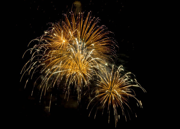 Amazing Beautiful firework on black background for celebration anniversary merry christmas eve and happy new year.