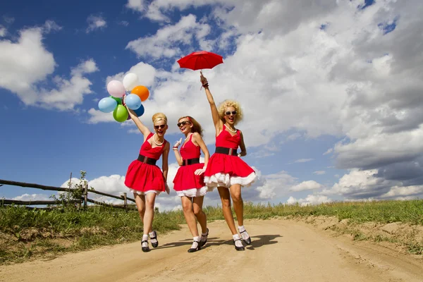 Red dresses. — Stock Photo, Image