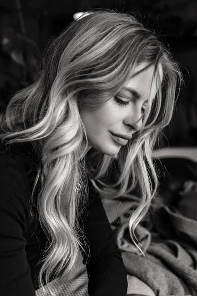 Close up portrait a beautiful woman with curly hair.