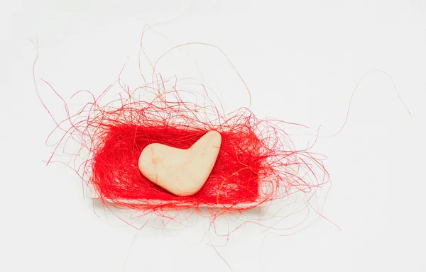 Stone in the shape of a heart lies — Stock Photo, Image