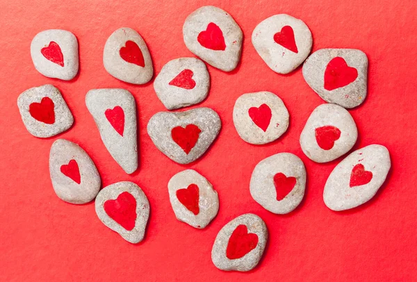 Stones painted with red hearts — Stock Photo, Image