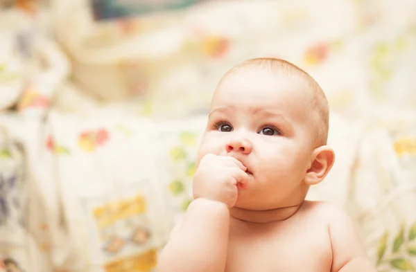 Little child eating biscuit — Stock Photo, Image