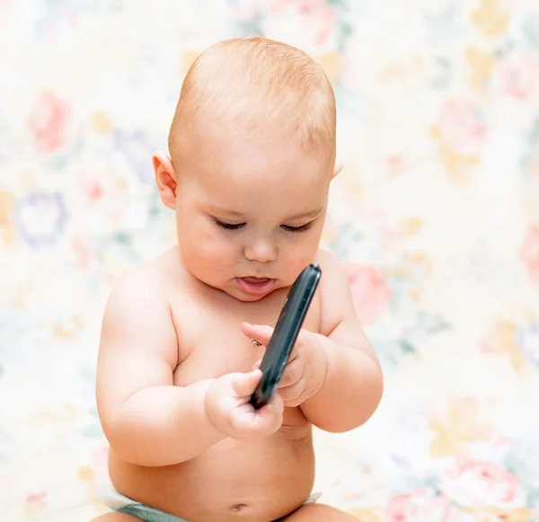 Baby with mobile phone — Stock Photo, Image