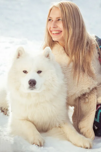Girl with samoed dog — Zdjęcie stockowe