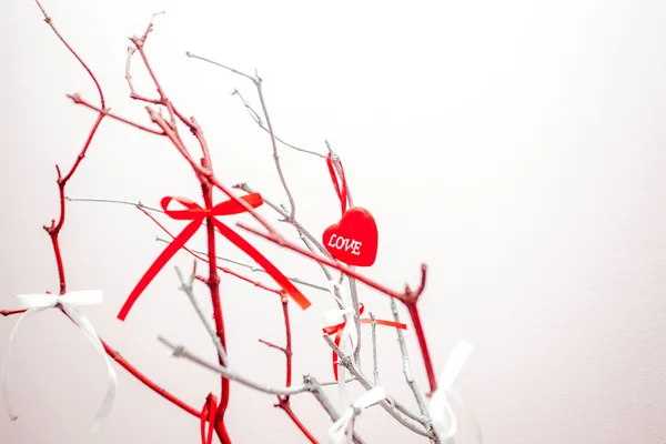 Red heart - Valentine with ribbon and branch — Stock Photo, Image