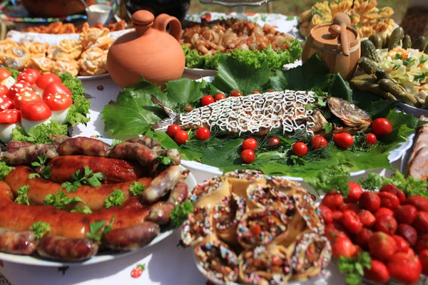 Gefilte fish with grilled meat sausages — Stock Image Gefilte fish with grilled meat sausages Stock Photo