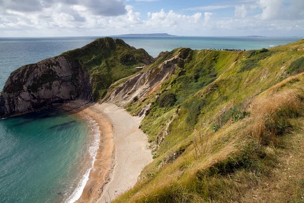 Falésias e praia ao lado de Durdle Door — Fotografia de Stock