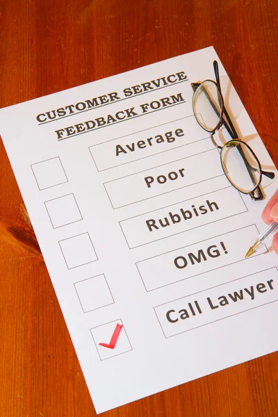 Spaß Kundenservice Feedback-Formular auf braun — Stockfoto