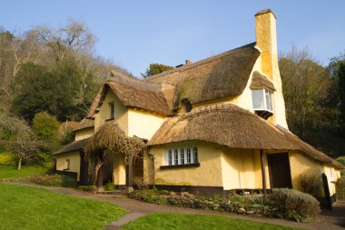 English Thatched Cottage Selworthy Somerset clipart