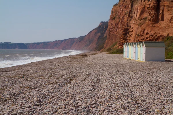 Cabanas de praia e penhascos de arenito Budleigh Salterton Devon — Fotografia de Stock