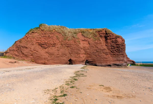 Czerwone skały plaży w pobliżu dawlish warren devon Anglia uk — Zdjęcie stockowe