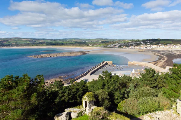 Looking out from St Michael's Mount of Marazion Cornwall England of the harbour wall and boats and mainland on a beautiful sunny summer day — Stock Photo, Image