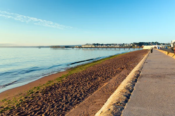 Paignton pier and sandy beach Torbay Devon England near tourist destinations of Torquay and Brixham — Stock Photo, Image