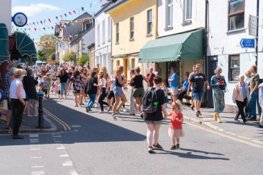 There was dancing in the street at the annual summer carnival in the beautiful Dartmoor town of Moretonhampstead Devon England on Thursday 25th August 2022