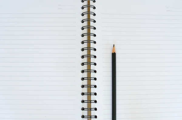 Ноутбук с карандашом — стоковое фото
