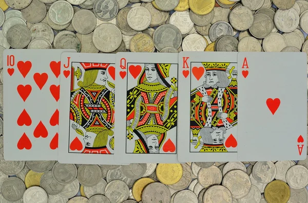 Poker kaart en munten — Stockfoto